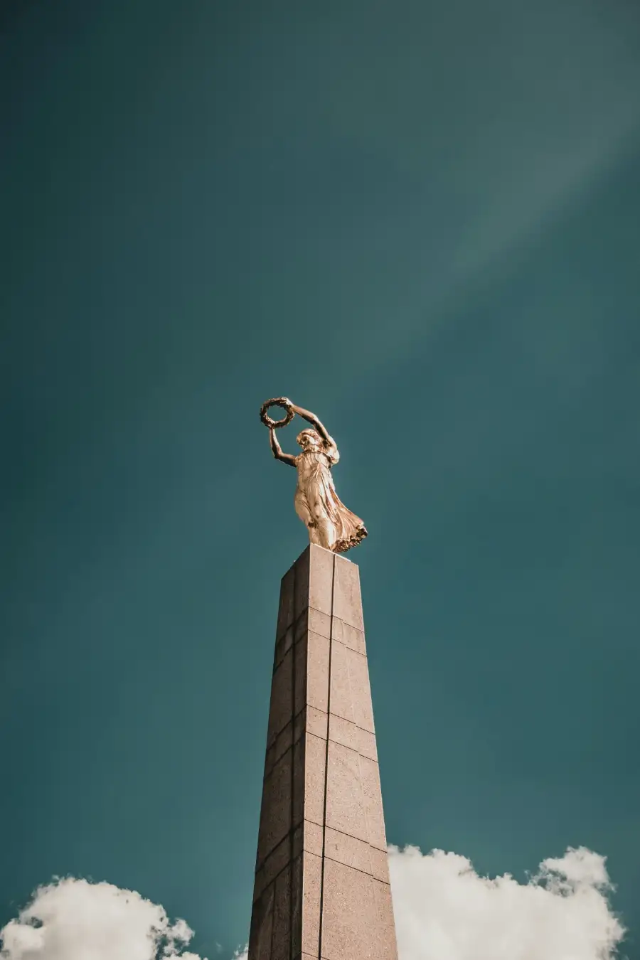 The Gëlle Fra in Luxembourg City against a deep blue sky
